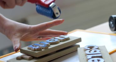Rolling ink onto letters